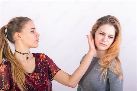 Two Babe Woman Fighting A Slapping In The Face Stock Photo Adobe Stock