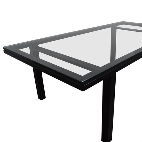 Glass or acrylic stays in the background to let your rugs or accent chairs be the center of attention. 80% OFF - Rectangular Glass and Black Coffee Table / Tables