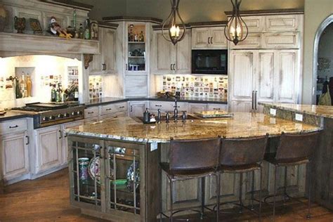 Kitchens with white cabinetry have a lot of flexibility as the natural wood cabinet trend grows, so does the desire to see the wood grain on even painted cabinets. Rustic white washed kitchen | White kitchen rustic, Simple ...