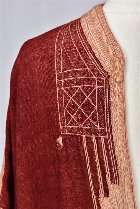 A Berber Djellaba In Dyed Cochineal Embroidered Wool North Africa