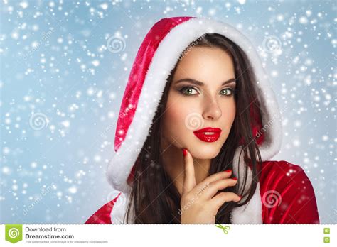 Beautiful Young Happy Woman In Santa Claus Clothes Over Christmas Background Smiling Woman Over