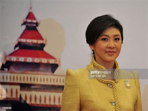 Thailand Prime Minister Yingluck Shinawatra Poses For Photo Before A
