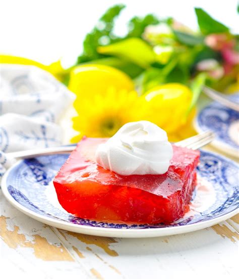 This post and recipe was created for #summerdessertweek! Strawberry Sunshine Jello Salad | FaveHealthyRecipes.com