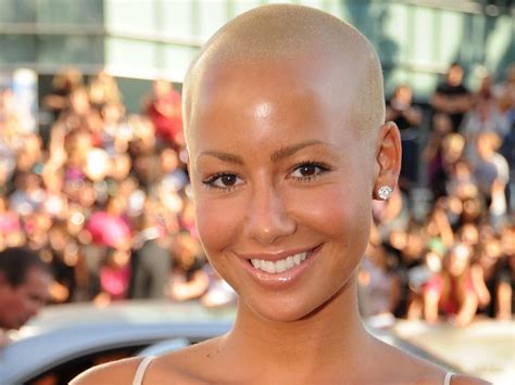 Amber Rose Is Wearing A New Look As She Poses In Lacy Lingerie Look