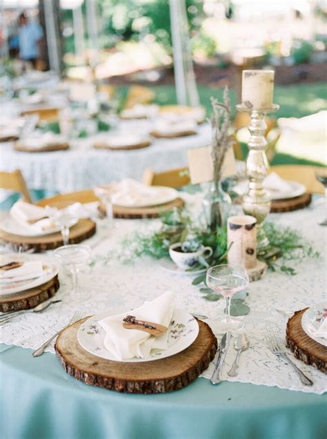 Rustic Wood Chargers And Simple Greenery Centerpiece