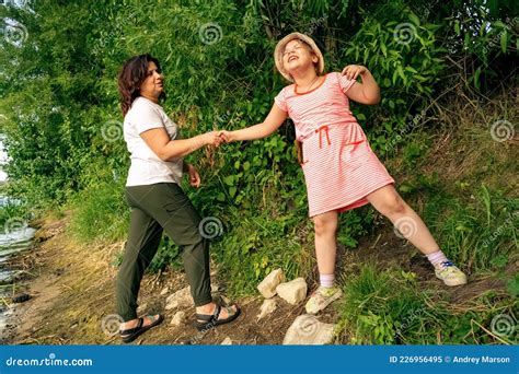Happy Loving Woman With Her Daughter In Nature On A Sunny Summer Day Stock Image Image Of Love