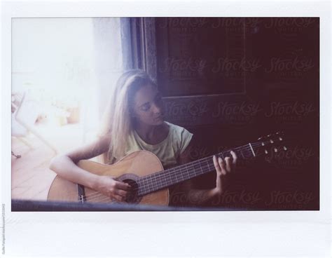 Girl Playing The Guitar By Stocksy Contributor Guille Faingold