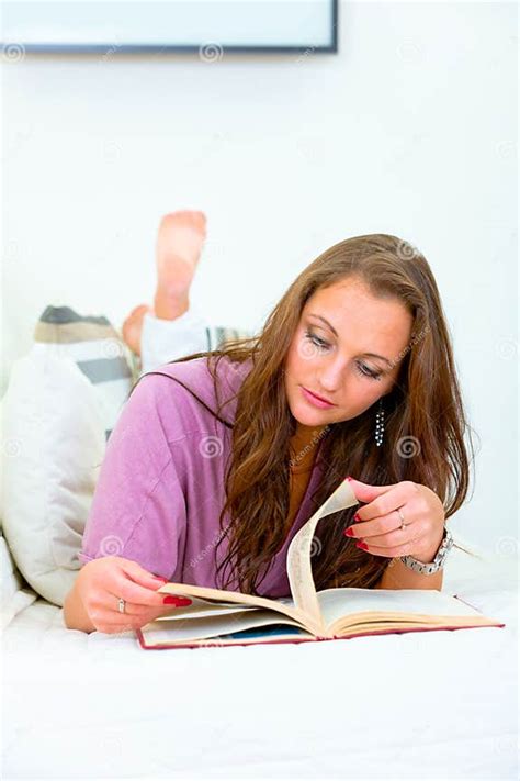 Young Woman Relaxing On Sofa And Reading Book Stock Image Image Of Feminine Housewife 19504783