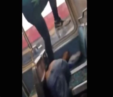 Woman Stomps And Kicks Man On Train For Calling Her Racial Slurs