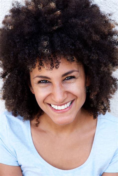 Close Up Cheerful Beautiful Woman With Curly Hair On White Stock Photo