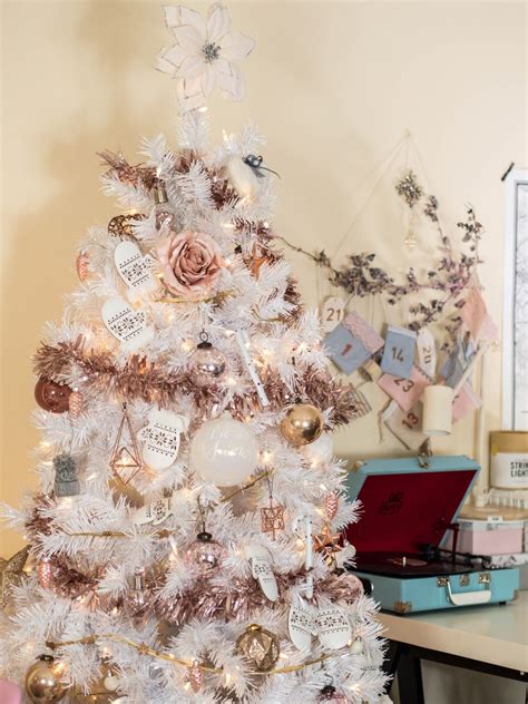 Maybe you would like to learn more about one of these? white christmas tree with rose gold and pink decorations ...