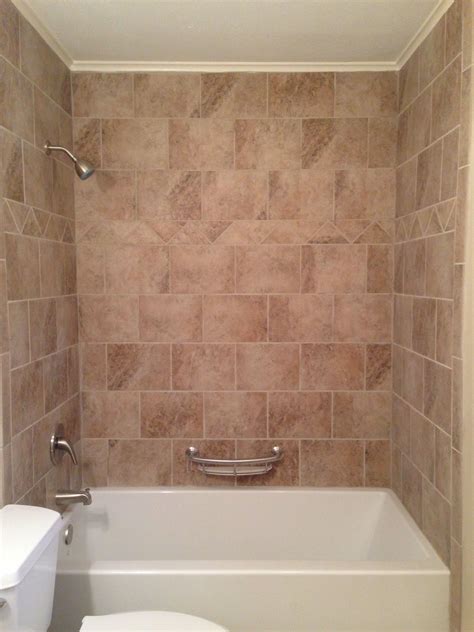 We had plans to get rid of it as soon as we moved in, but then surprisingly we. Tile surround bathtub. Beige tile around bathtub. | Tile ...