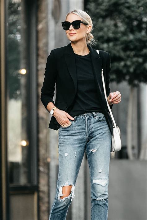 Blonde Woman Wearing Black Blazer Black Tshirt Denim Ripped Jeans