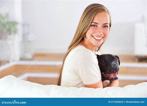 Hes Not Only Mans Best Friend Portrait Of An Attractive Young Woman