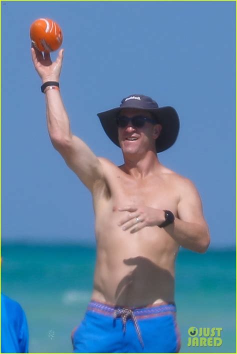 peyton manning flaunts ripped abs while shirtless at the beach photos photo 4492993 bikini