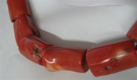 Red Coral Beads Or Fake Antiques Board