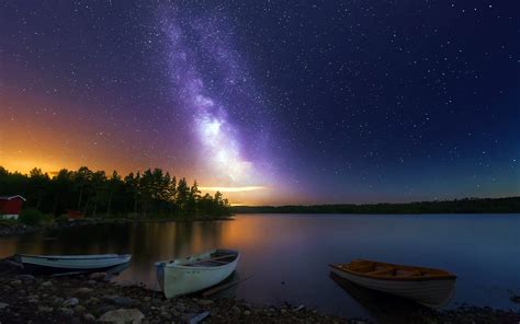 Peaceful Lake Boats Wooden House Forest Sky With Stars