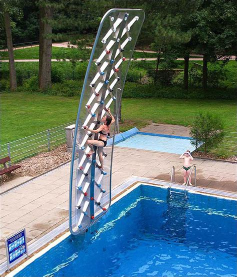 Wall climber climbing walls in all shapes and sizes. Aquaclimb Sport - Poolside Climbing Wall