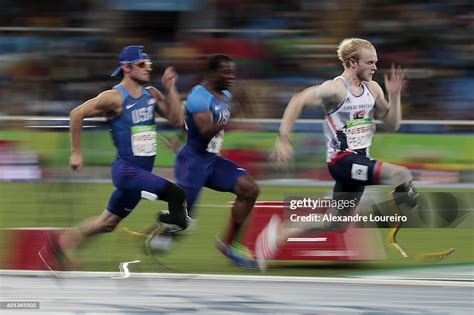 Jonnie Peacock Of Great Britain Leads The Mens 100m T44 Final On Day