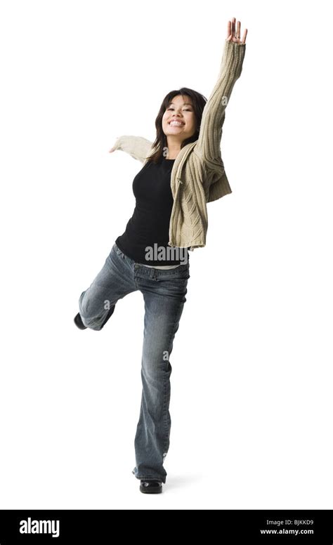 Casually Dressed Woman Leaping Stock Photo Alamy