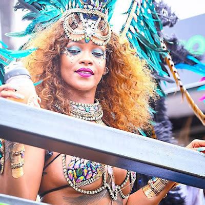 View Photos Of Rihanna In A Revealing Bikini Costume Which Exposes Her