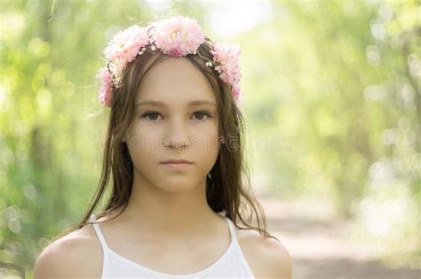 Beautiful Caucasian Preteen Girl Wearing Flower Wreath And