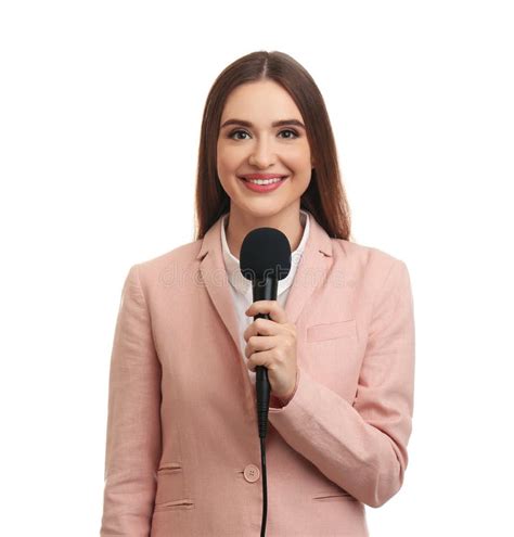 Young Female Journalist With Microphone On Background Stock Photo