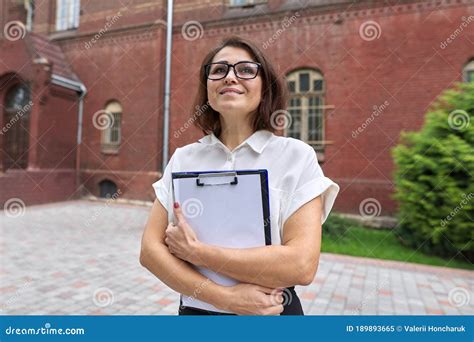Portrait Of Confident Smiling Businesswoman Female Teacher Counselor