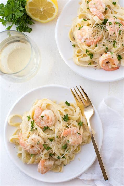 Turn heat to low and let simmer for 2 to 3 minutes. Lemon Garlic White Wine Shrimp Fettuccine Pasta - Spoonful ...
