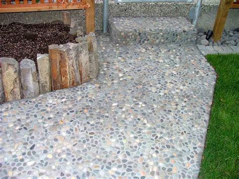 Pebble Tiles On Exterior Corner Of The Step Pebble Tile Pebble Floor