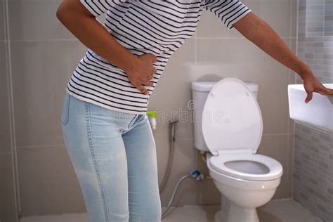 The Woman Has Diarrhea And Problems With Stomach Pain Leftover Toilet