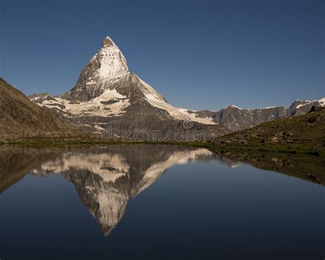 Famous Matterhorn Mountain With The Reflection On The Lake Stock Image