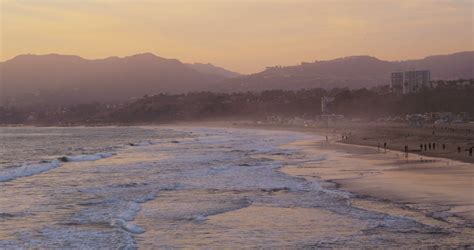 Waves Coming In At Sunset On California Beach Stock Video Footage 0017