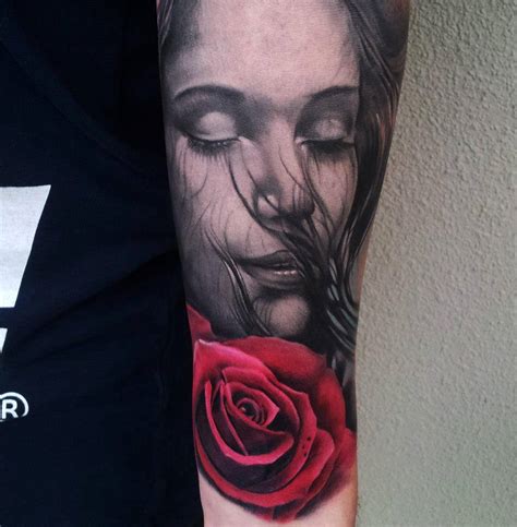 3d Girl Face And Red Rose Tattoos On Arm