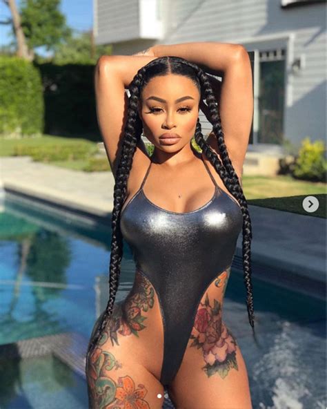 Blac Chyna Flaunts Her Curves As She Poses In A Very Daring High Rise Silver Swimsuit Photos