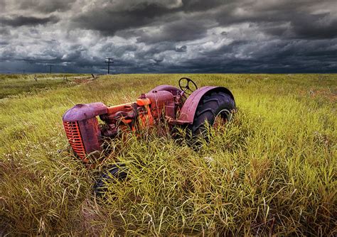 Old Rusty Farm Tractor Abandoned On The Prairie Photograph By Randall Nyhof