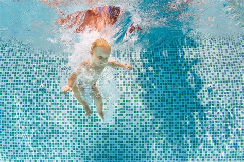 Happy Child Dive Underwater With Fun Containing Swimming Pool And