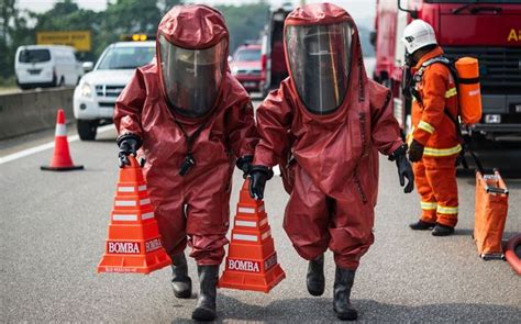 Pictures Of The Day 24 June 2014 Hazmat Suit Emergency Response