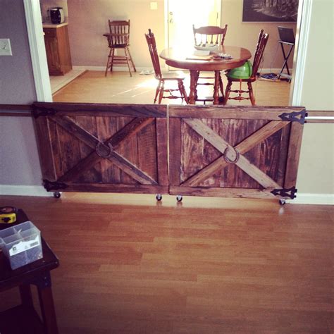 We supplied the sliding gate frame and all of the post and rolling gear. Rolling Barn Door Style Top Of Stairway Gate? : DIY