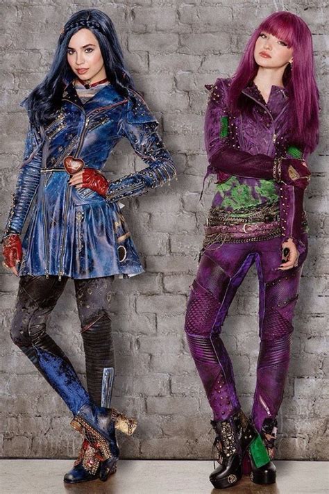 Disney S Descendantss 2 Movie Poster With Two Women In Costumes Standing Next To Each Other