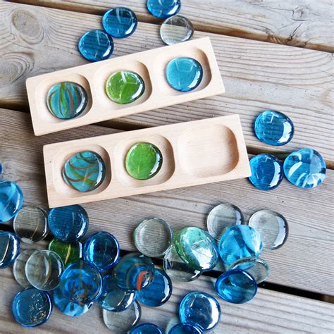 Coloured Glass Pebbles Early Years Direct