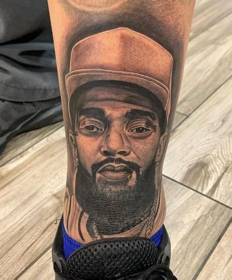 Best Nipsey Hussle Tattoos And Tattoo Ideas Nsf News And Magazine