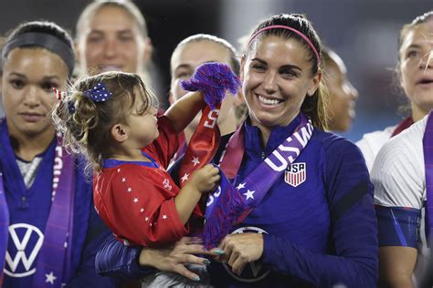 Alex Morgan Posts Iconic Photo Holding Her Daughter After Signing New Cba Agreement For Uswnt
