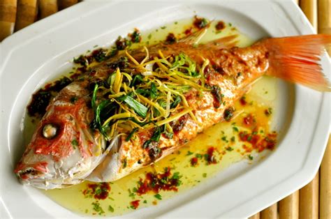 At chinese new year, these chinese fish decorations are everywhere. Dragon Tea Steamed Snapper in a Spicy Brown Bean Sauce a ...