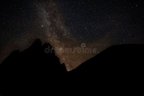 Saturn Appear At The Base Of Milky Way With Dolomite Mountain