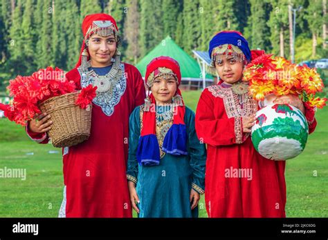 Kids Dressed In Traditional Kashmiri Dresses Pose For A Photo On A