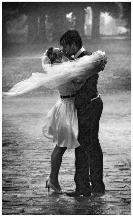 What A Romantic Picture This Couple Is Really Enjoying The Rain And Is