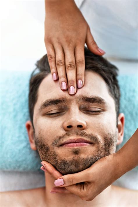 Handsome Man Having Massage In Spa Salon Stock Image Image Of Wellness Towels