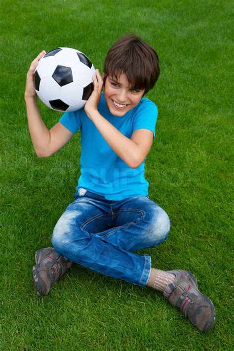 Boy Holding Football Ball Stock Image Colourbox