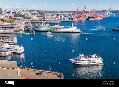 Aerial View Of Ferries And Waterfront Harbor Area Of Seattle Washington